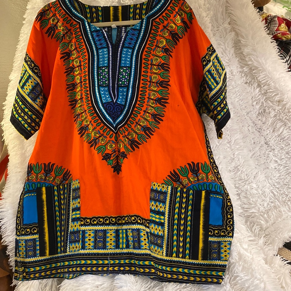 Used Authentic African Dashiki multi/color top. Lightweight Cotton